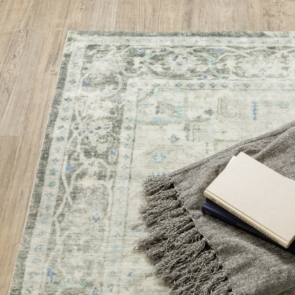 2' X 8' Grey Ivory And Blue Oriental Power Loom Stain Resistant Runner Rug