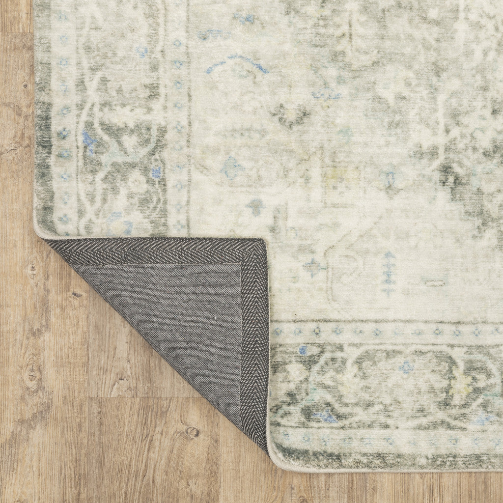 5' X 7' Grey Ivory And Blue Oriental Power Loom Stain Resistant Area Rug