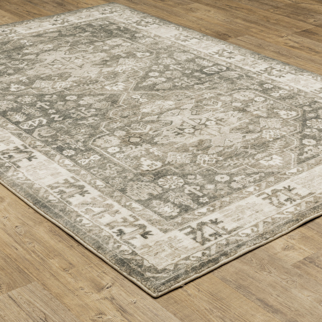 8' X 10' Grey Ivory Tan And Beige Oriental Power Loom Stain Resistant Area Rug