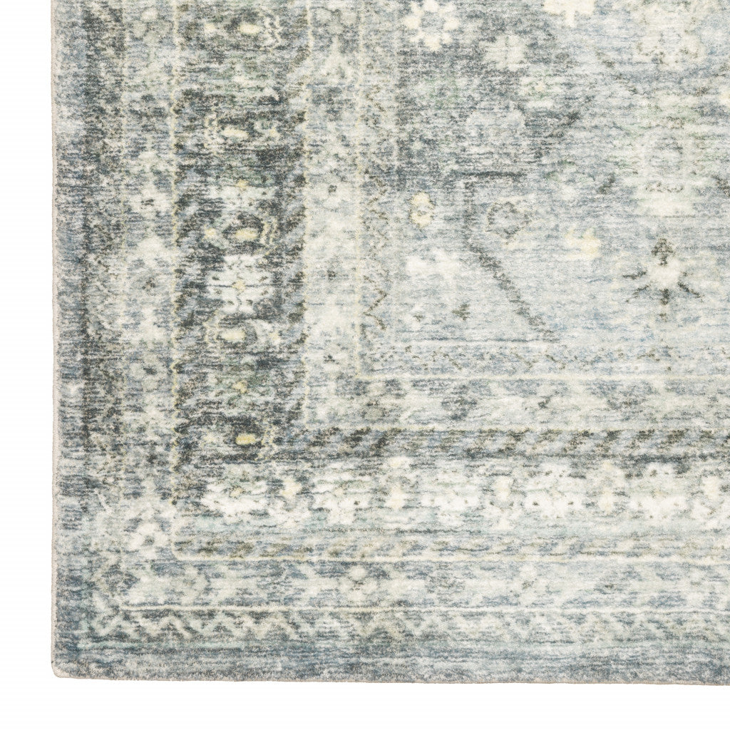 5' X 7' Blue Ivory And Grey Oriental Power Loom Stain Resistant Area Rug