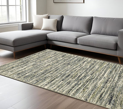 10' X 13' Blue Green Light Blue Grey And Ivory Abstract Power Loom Stain Resistant Area Rug
