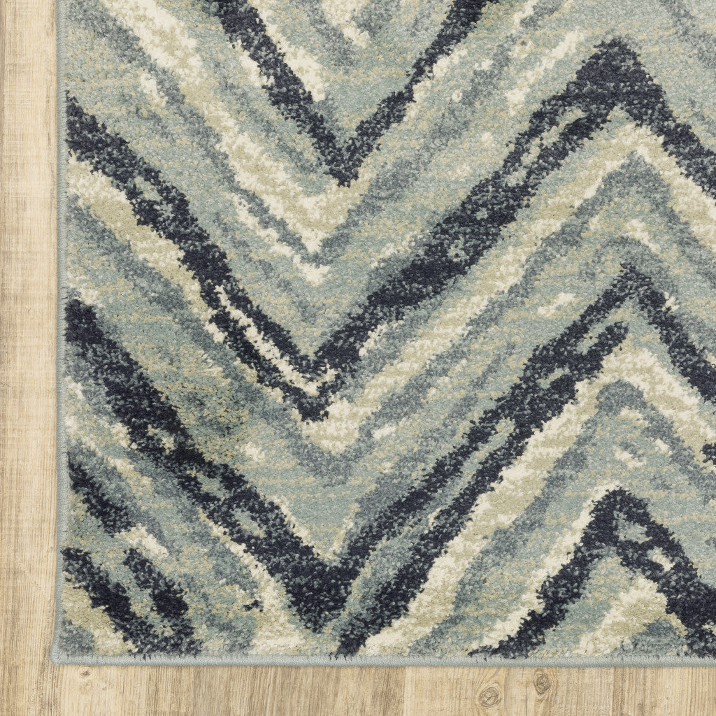 4' X 6' Blue Ivory Grey Beige And Light Blue Geometric Power Loom Stain Resistant Area Rug