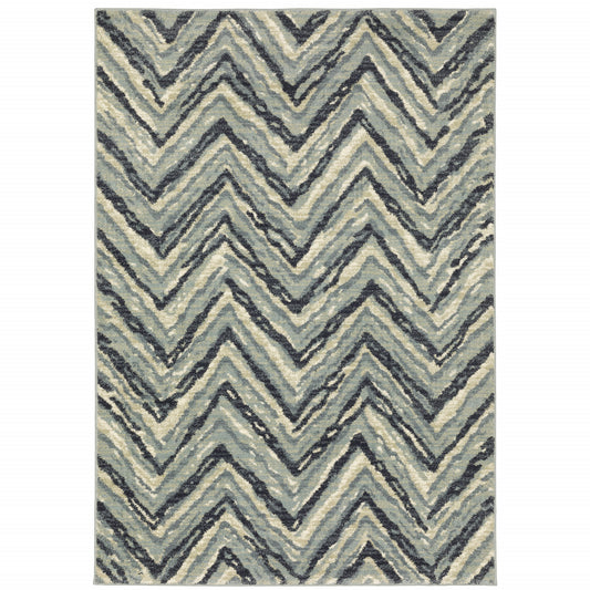 5' X 7' Blue Ivory Grey Beige And Light Blue Geometric Power Loom Stain Resistant Area Rug