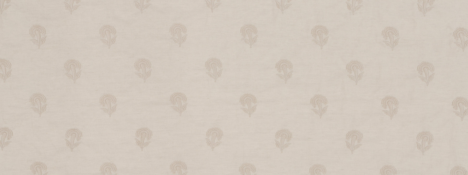 Oyster fabric with a tiny pale skull motif in a repeating pattern; soft textile for apparel or home decor.