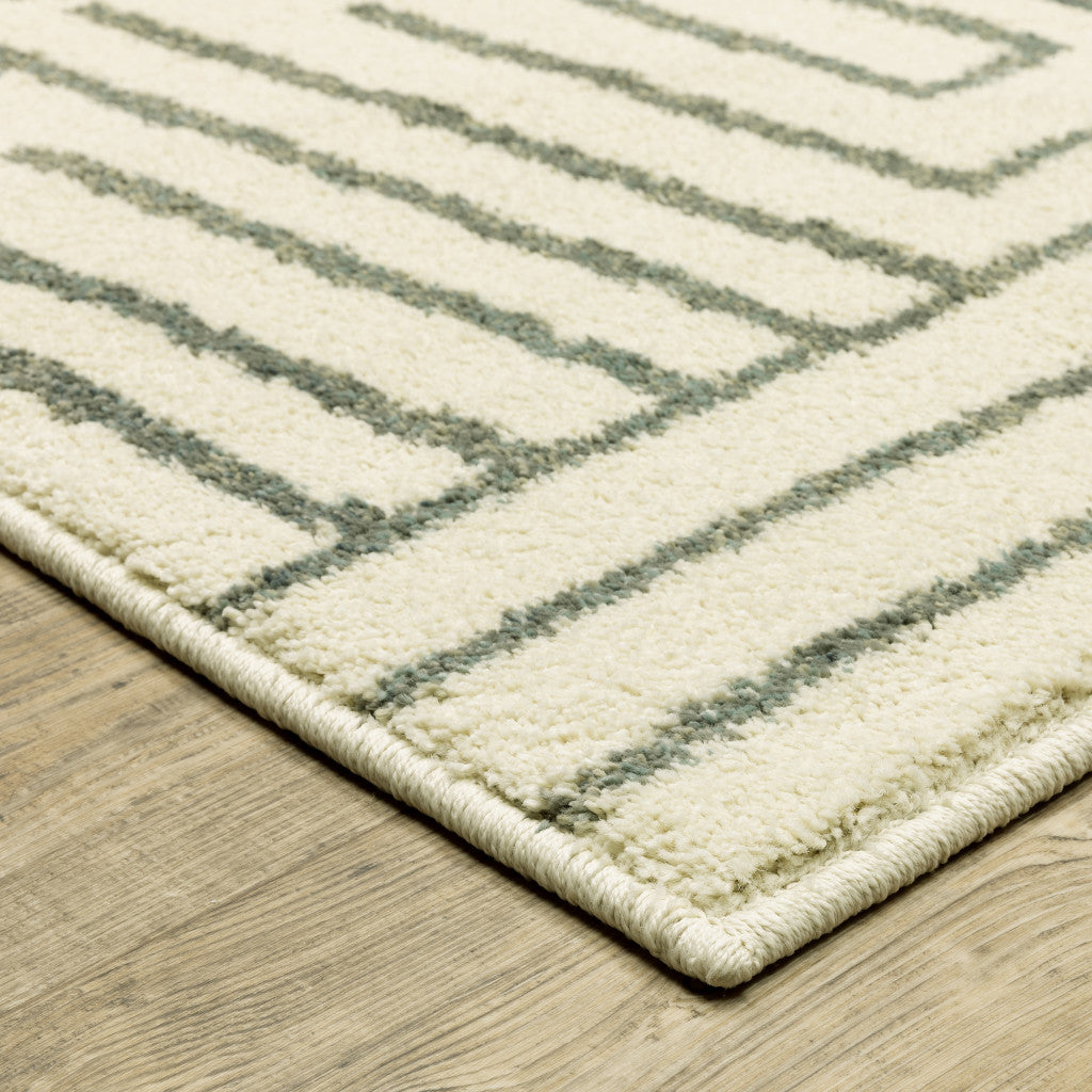 4' X 6' Beige Grey And Light Blue Geometric Power Loom Stain Resistant Area Rug