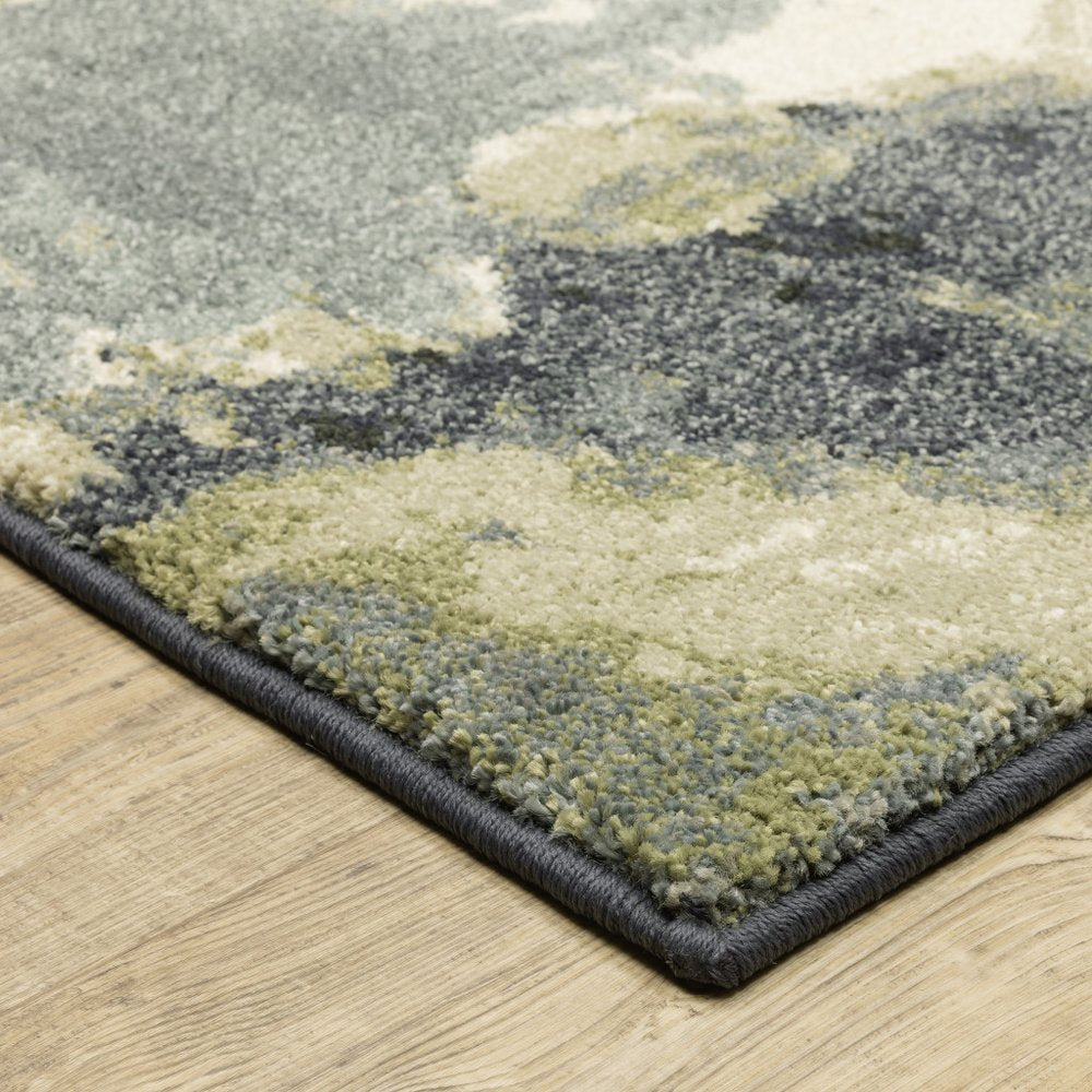 10' X 13' Blue Green And Ivory Abstract Area Rug