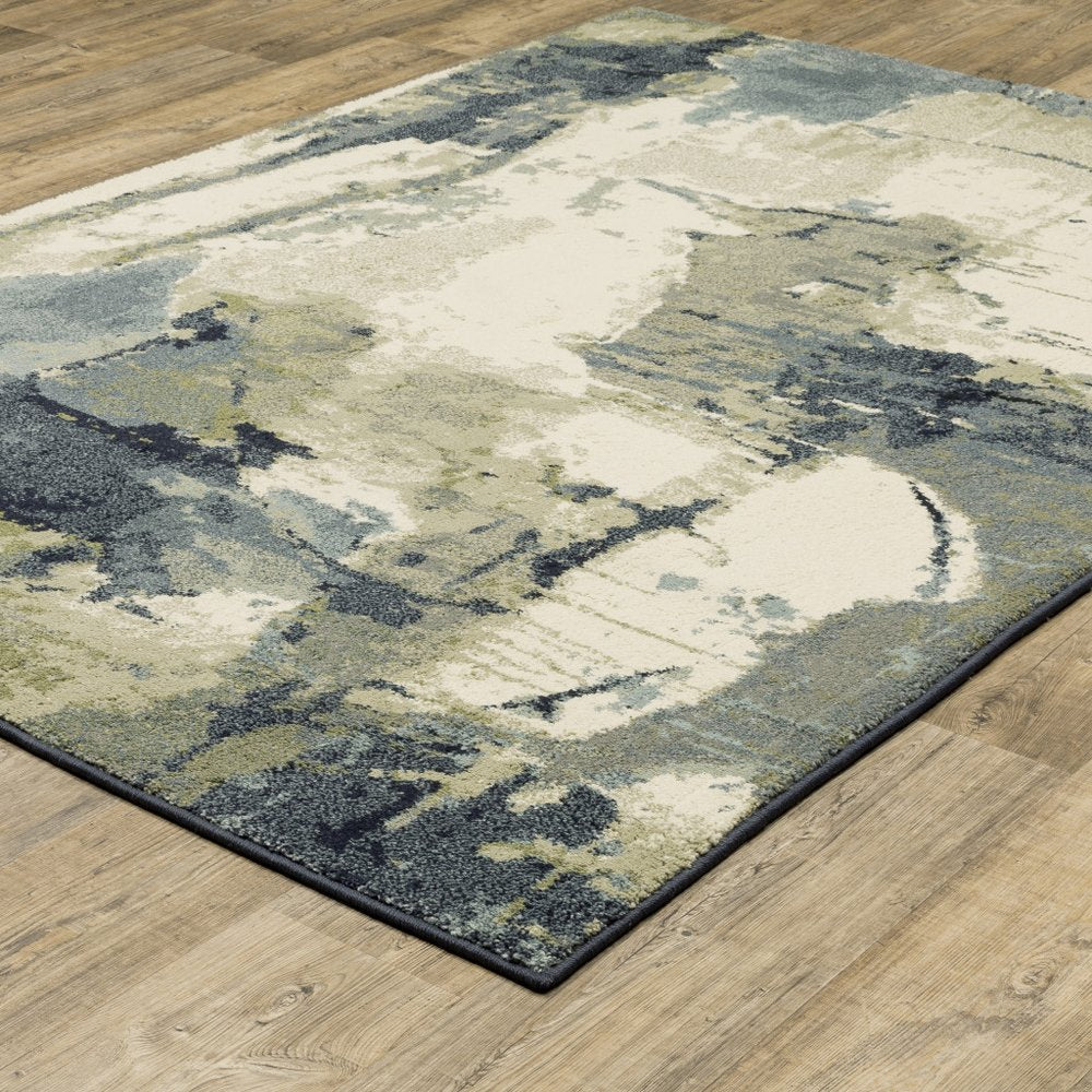 10' X 13' Blue Green And Ivory Abstract Area Rug