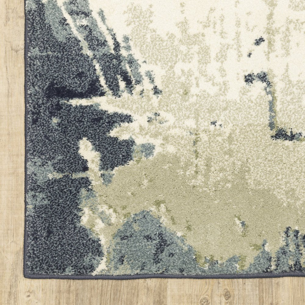 10' X 13' Blue Green And Ivory Abstract Area Rug