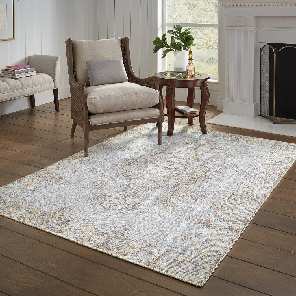 5' X 8' Grey And Gold Oriental Power Loom Stain Resistant Area Rug