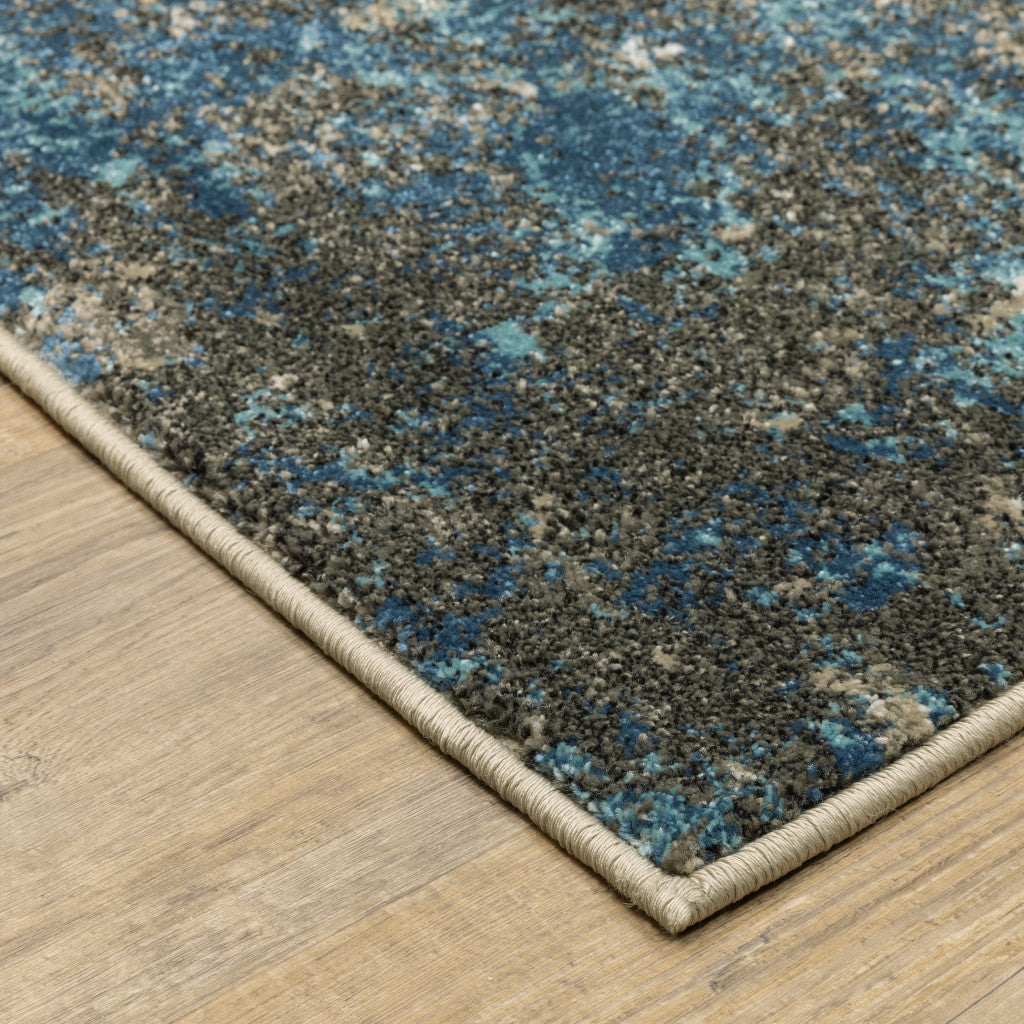 5' X 7' Blue Grey And Beige Abstract Power Loom Stain Resistant Area Rug