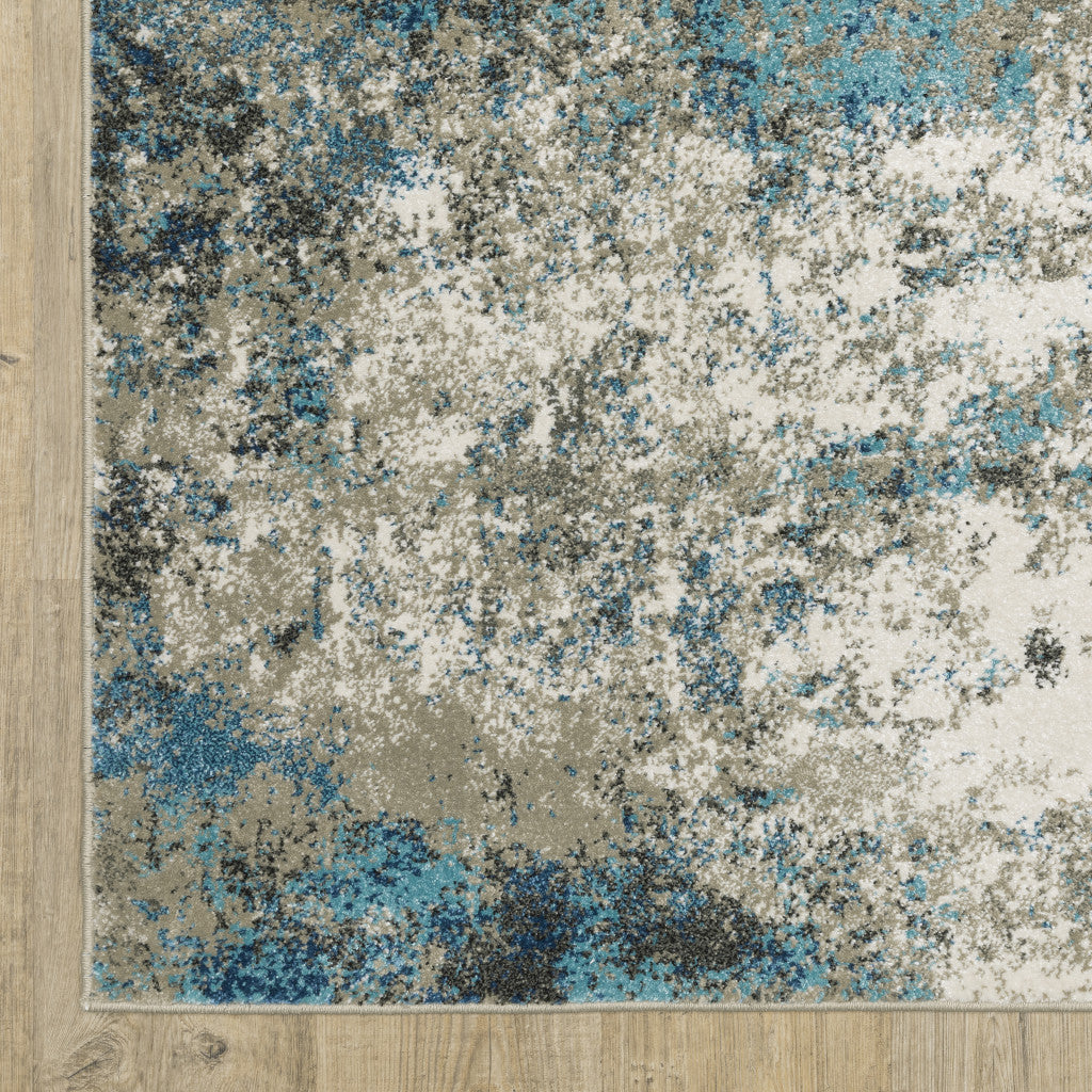 5' X 7' Blue Grey And Beige Abstract Power Loom Stain Resistant Area Rug