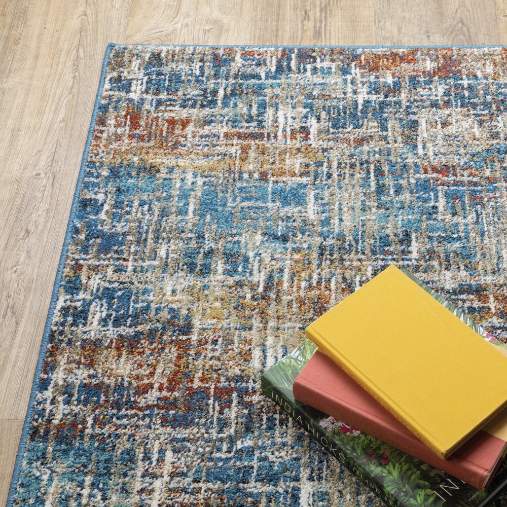 7' X 9' Blue And Beige Abstract Area Rug