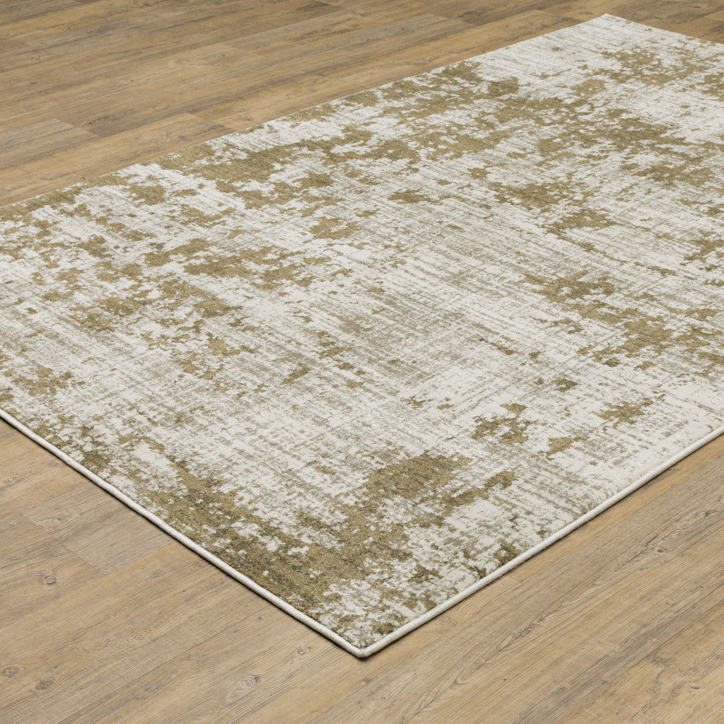 4' X 6' Beige Gold And Grey Abstract Power Loom Stain Resistant Area Rug