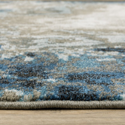 7' X 9' Blue And Beige Abstract Area Rug