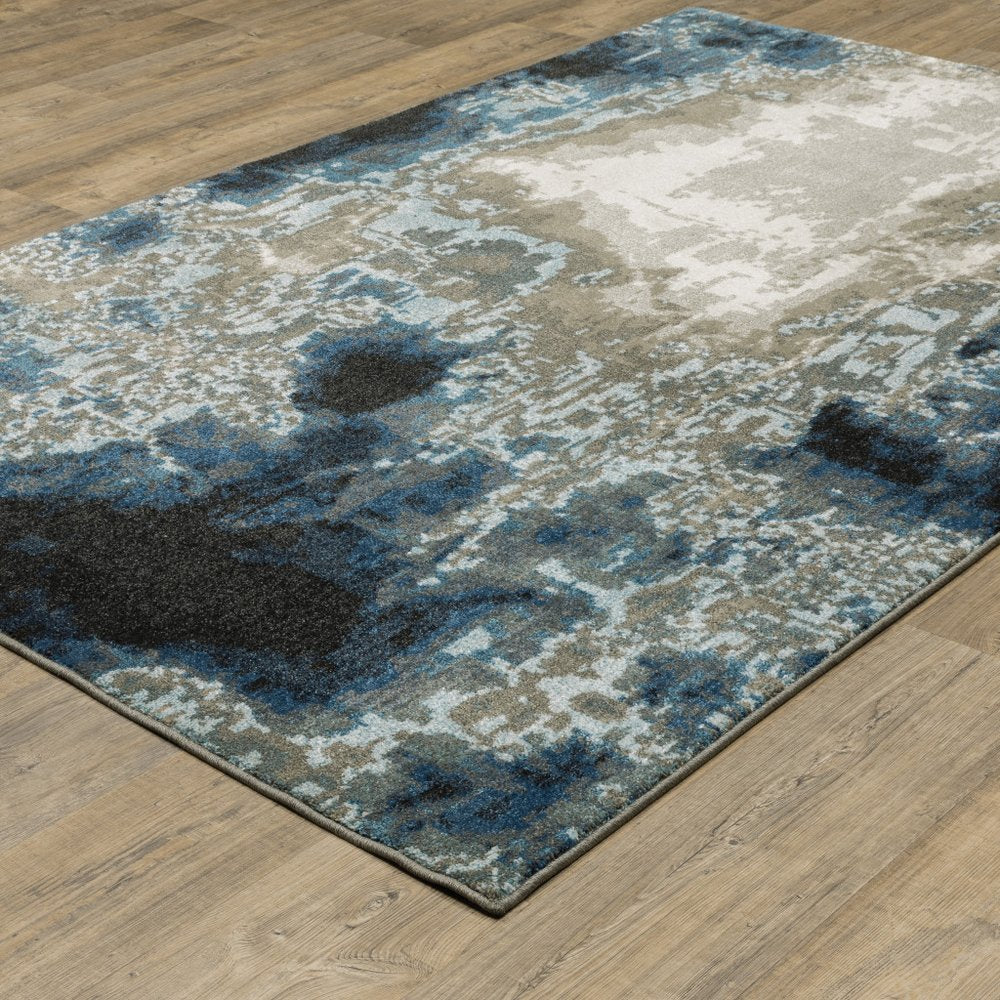 7' X 9' Blue And Beige Abstract Area Rug