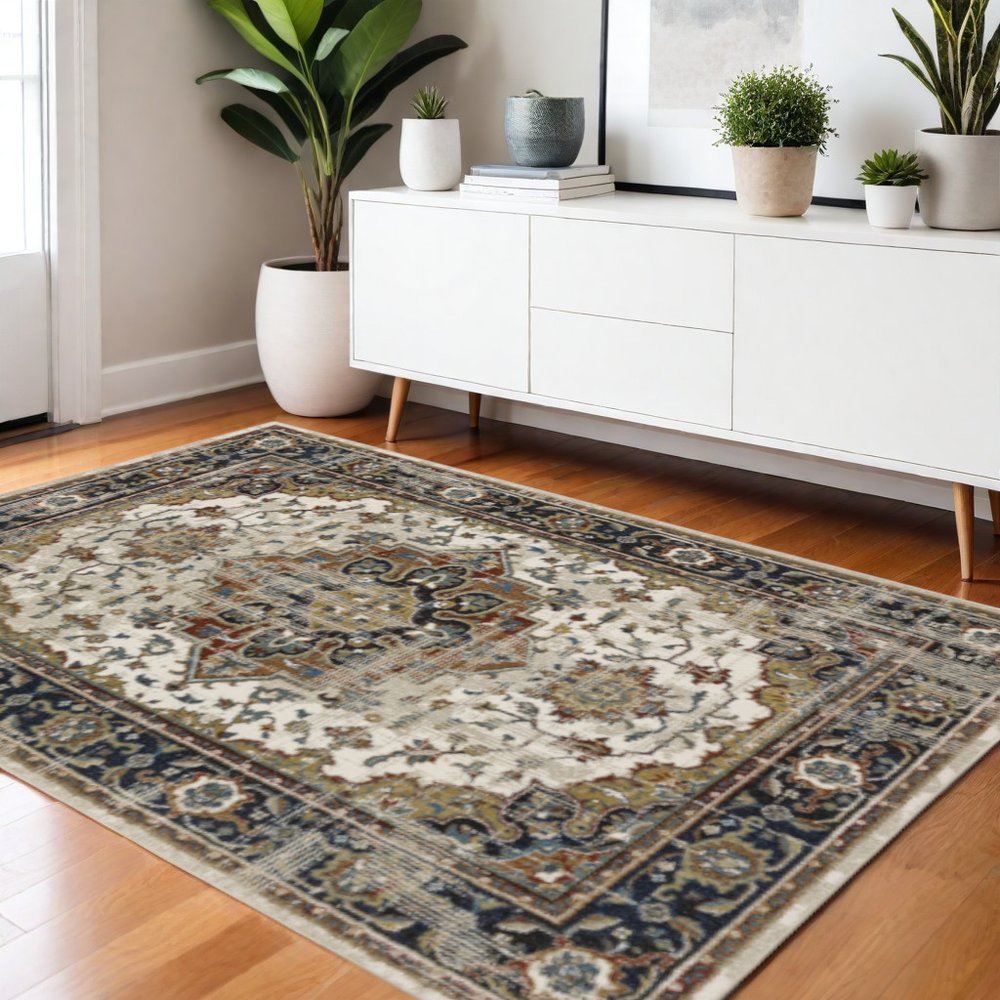4' X 6' Beige Blue Green Rust And Grey Oriental Power Loom Stain Resistant Area Rug