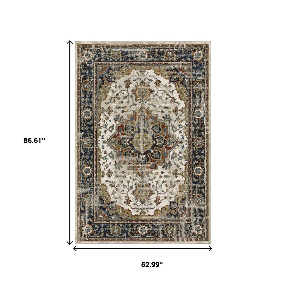 5' X 7' Beige Blue Green Rust And Grey Oriental Power Loom Stain Resistant Area Rug