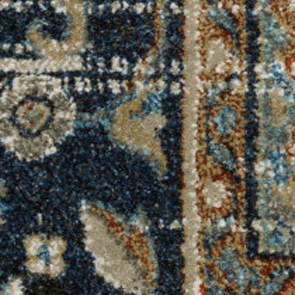 5' X 7' Beige Blue Green Rust And Grey Oriental Power Loom Stain Resistant Area Rug