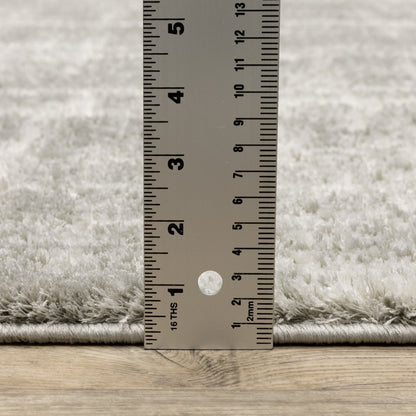 2' x 8' grey & ivory abstract shag runner rug, power loom construction, stain resistant.