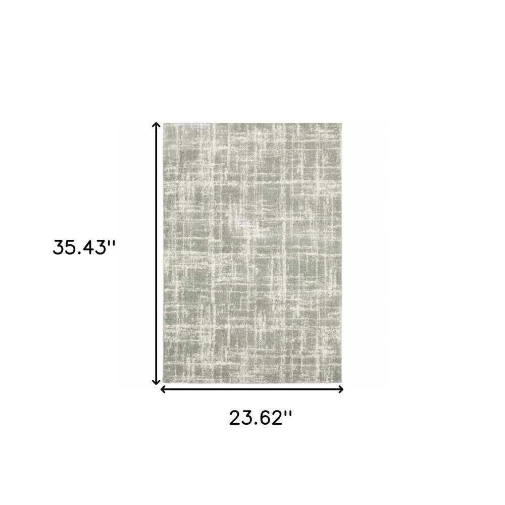 2' x 3' Grey and Ivory Abstract Shag Power Loom Stain Resistant Area Rug