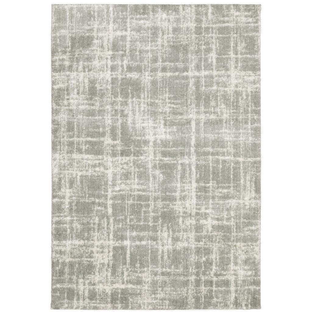 6' X 9' Grey And Ivory Abstract Shag Power Loom Stain Resistant Area Rug