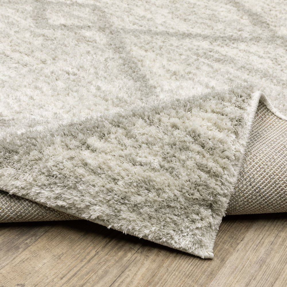2' x 8' ivory and grey geometric shag runner rug, power loom, stain resistant.