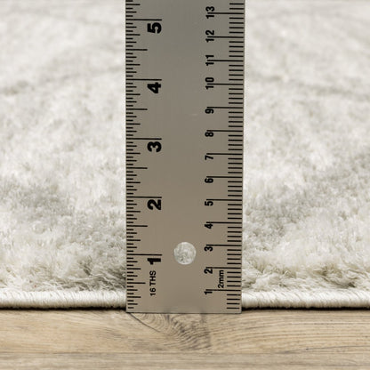 2' X 8' Ivory And Grey Geometric Shag Power Loom Stain Resistant Runner Rug