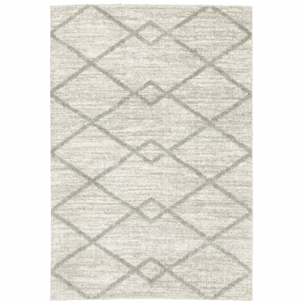 2' X 3' Ivory And Grey Geometric Shag Power Loom Stain Resistant Area Rug