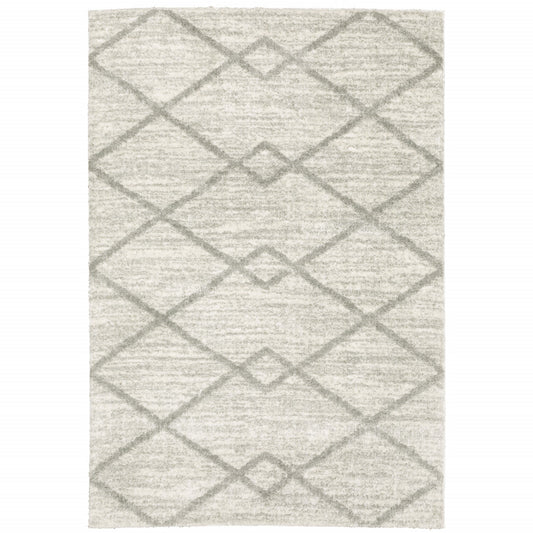 2' X 3' Ivory And Grey Geometric Shag Power Loom Stain Resistant Area Rug