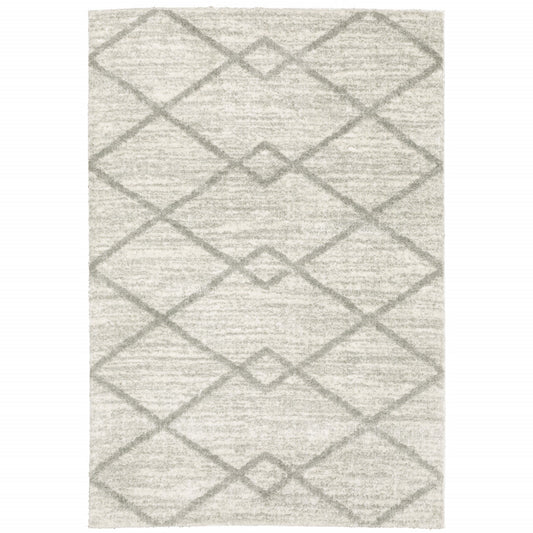 5' X 8' Ivory And Grey Geometric Shag Power Loom Stain Resistant Area Rug