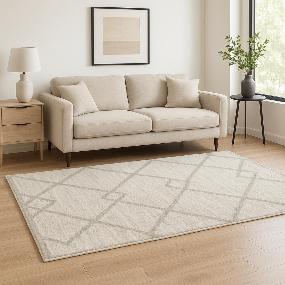 5' X 8' Ivory And Grey Geometric Shag Power Loom Stain Resistant Area Rug