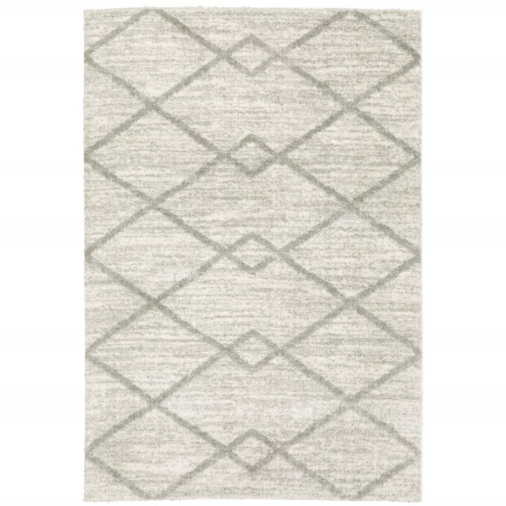 5' X 8' Ivory And Grey Geometric Shag Power Loom Stain Resistant Area Rug