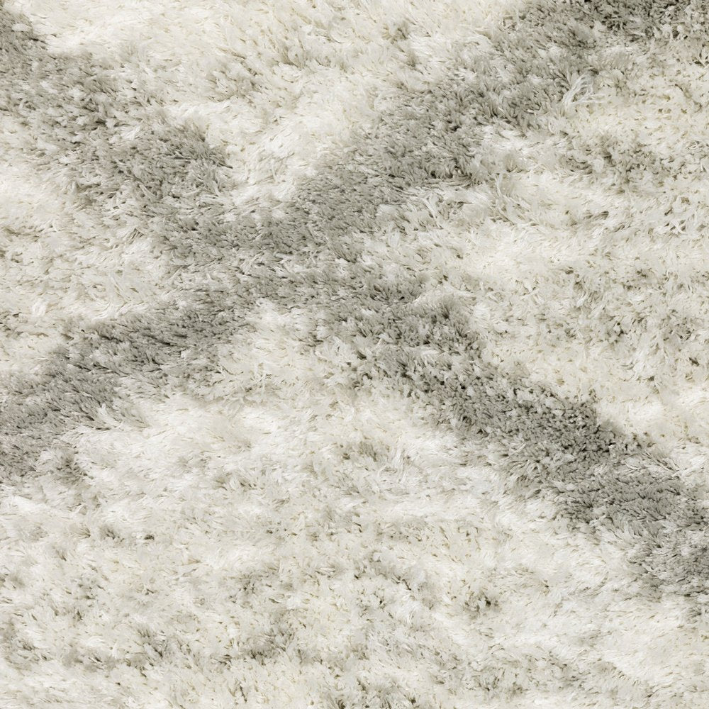 5' x 8' Ivory and Grey Geometric Shag Power Loom Stain-Resistant Area Rug