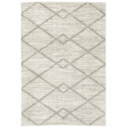 6' X 9' Ivory And Grey Geometric Shag Power Loom Stain Resistant Area Rug