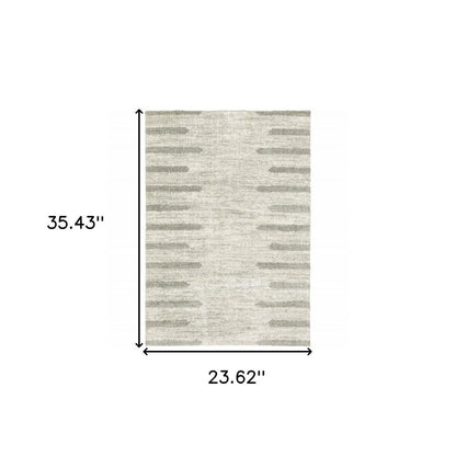 2' x 3' ivory and grey geometric shag area rug, power loom, stain resistant.