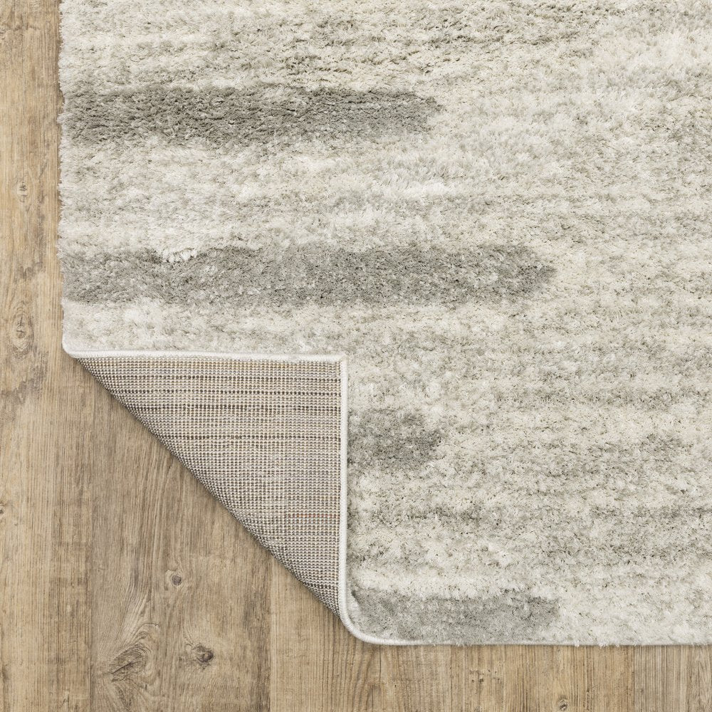 2' x 3' Ivory and Grey Geometric Shag Power Loom Stain Resistant Area Rug