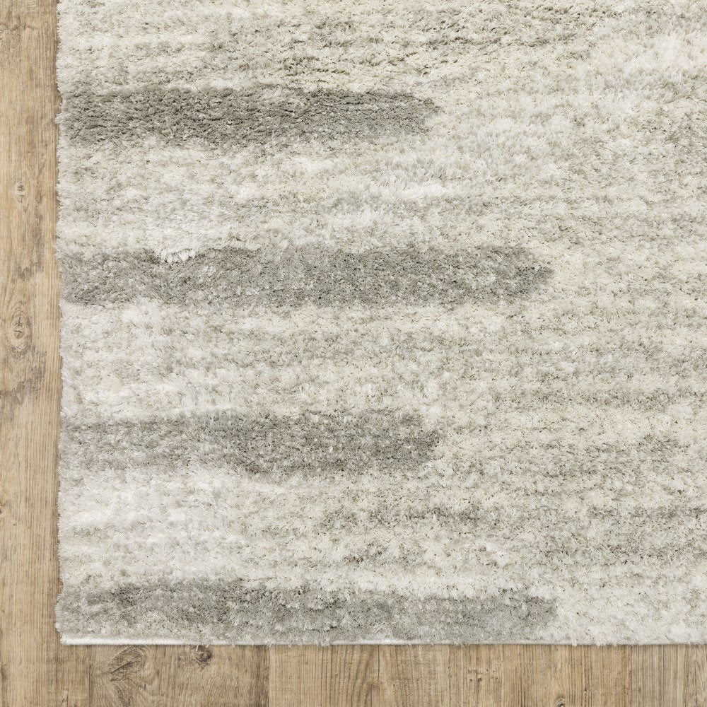 2' x 3' Ivory and Grey Geometric Shag Power Loom Stain Resistant Area Rug