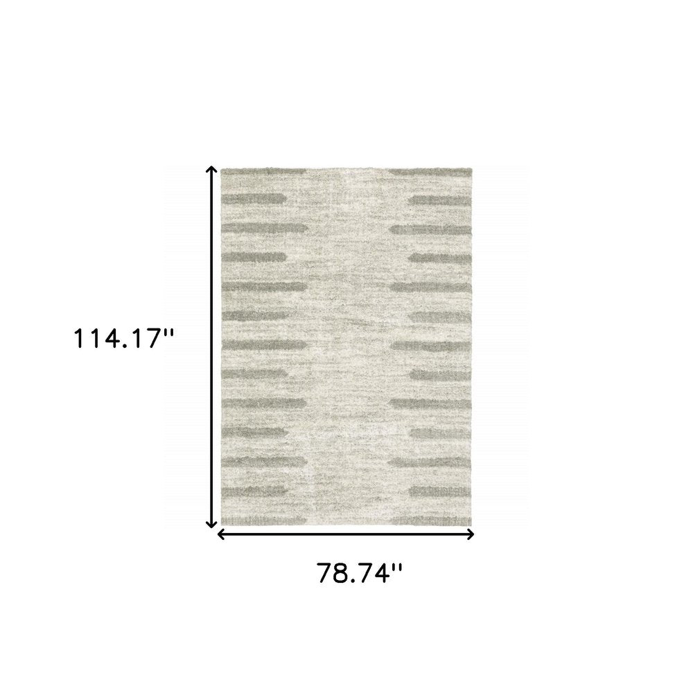 6' X 9' Ivory And Grey Geometric Shag Power Loom Stain Resistant Area Rug