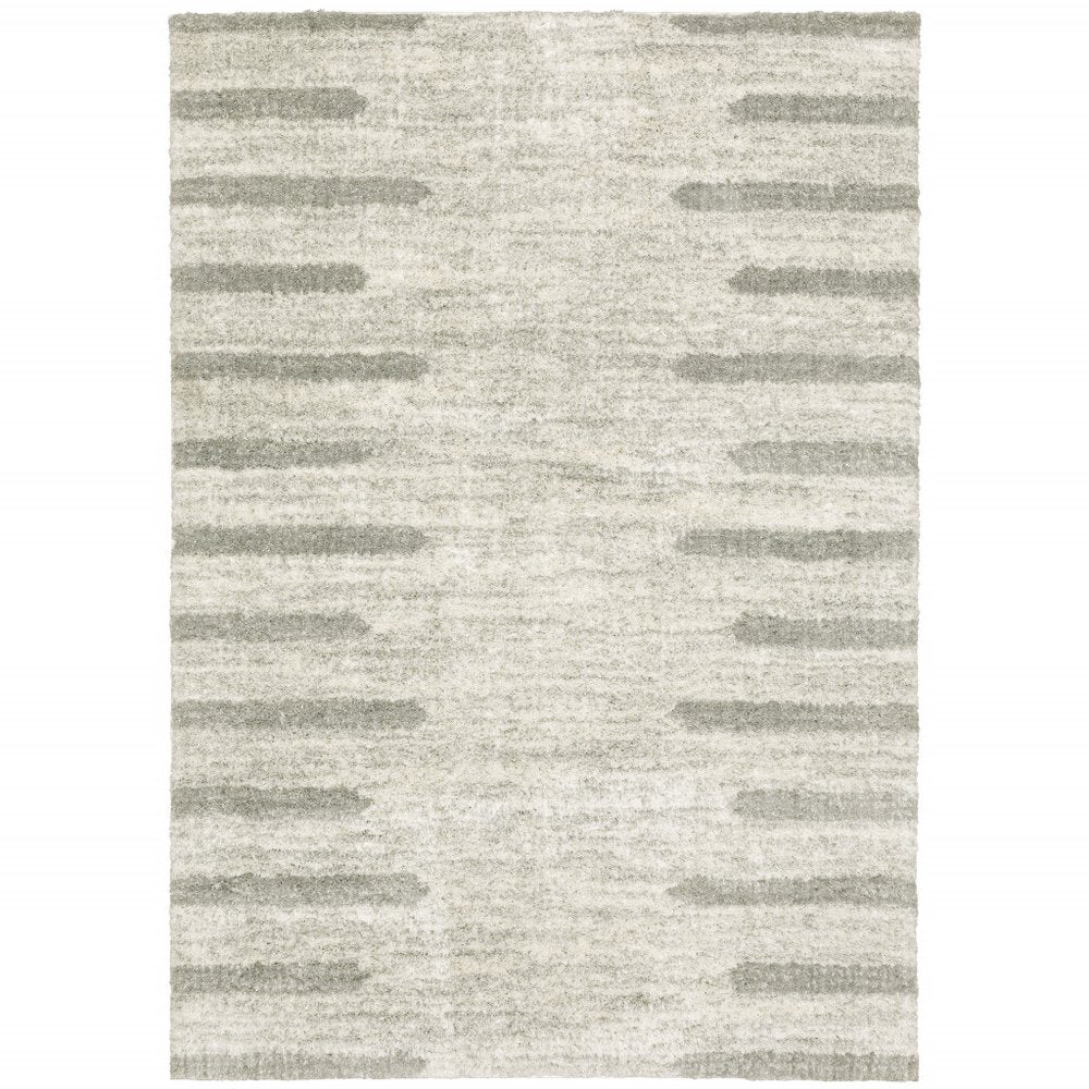 6' X 9' Ivory And Grey Geometric Shag Power Loom Stain Resistant Area Rug