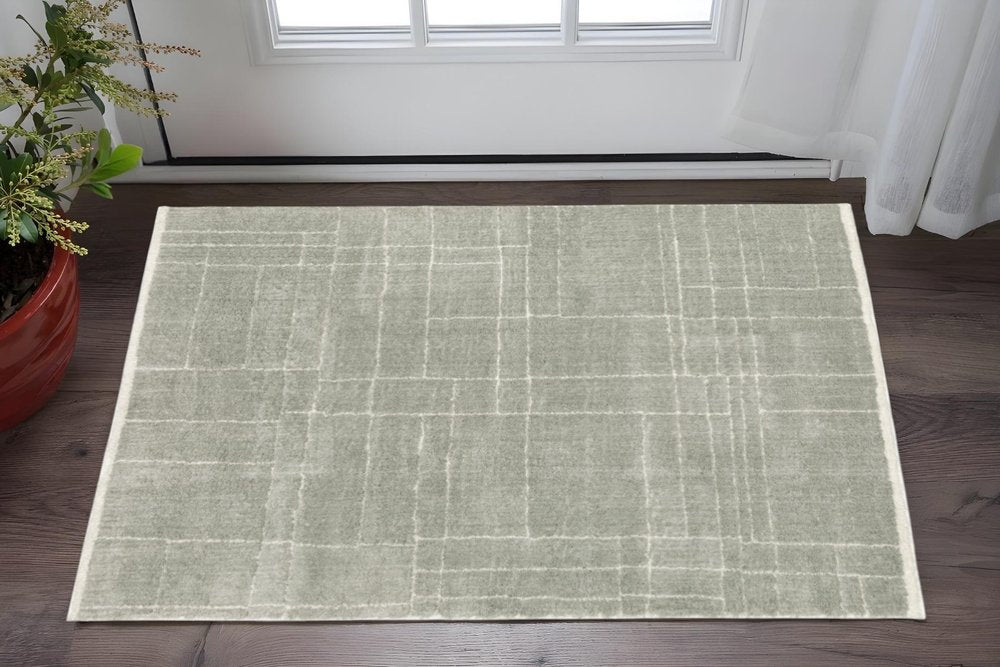 2' X 3' Grey And Ivory Geometric Shag Power Loom Stain Resistant Area Rug
