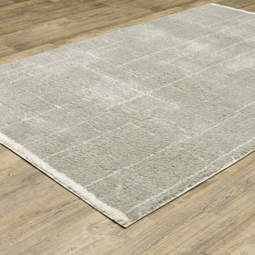 2' X 3' Grey And Ivory Geometric Shag Power Loom Stain Resistant Area Rug