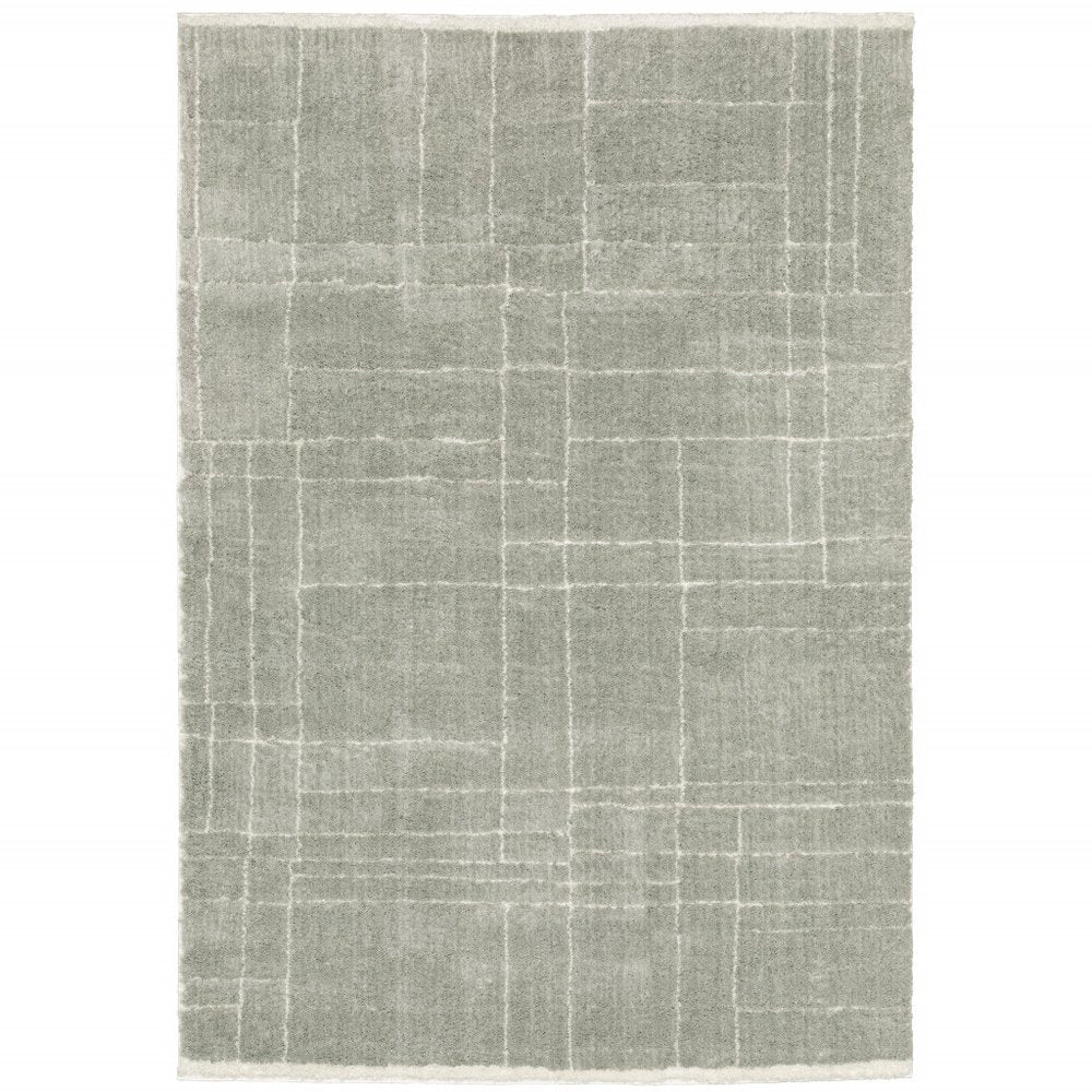 4' X 6' Grey And Ivory Geometric Shag Power Loom Stain Resistant Area Rug