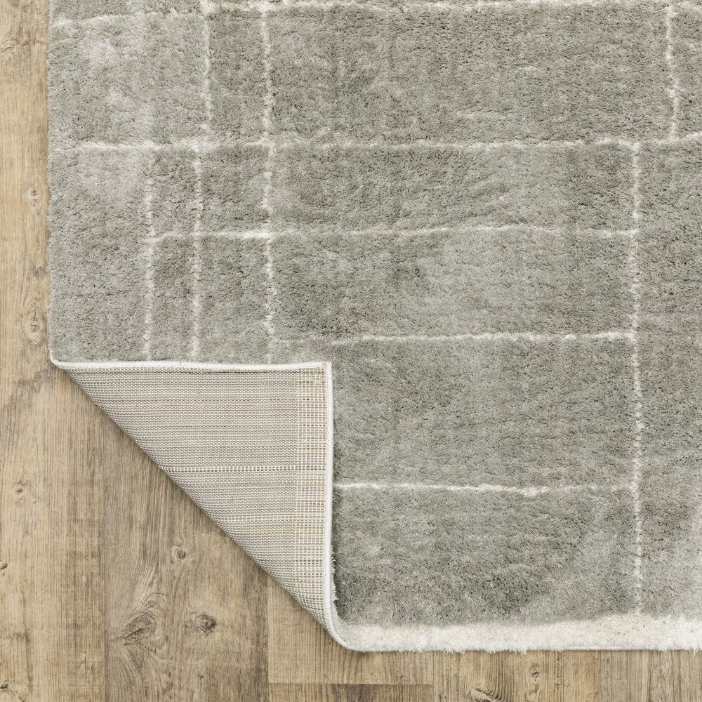 4' X 6' Grey And Ivory Geometric Shag Power Loom Stain Resistant Area Rug