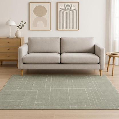5' X 8' Grey And Ivory Geometric Shag Power Loom Stain Resistant Area Rug
