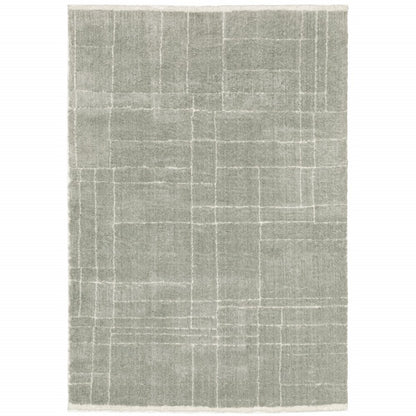 5' X 8' Grey And Ivory Geometric Shag Power Loom Stain Resistant Area Rug