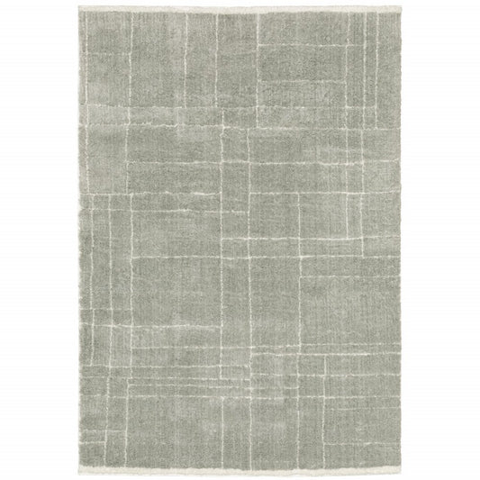 6' X 9' Grey And Ivory Geometric Shag Power Loom Stain Resistant Area Rug