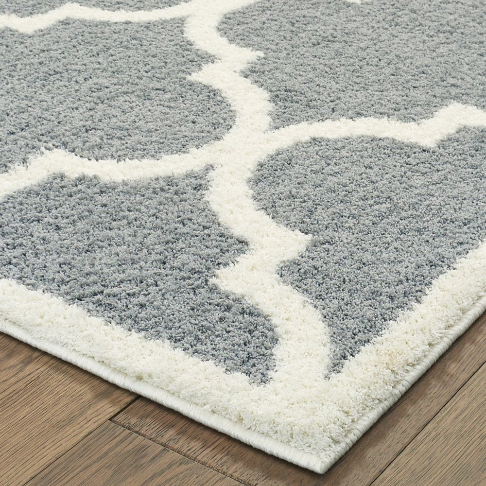 5' X 8' Grey And Ivory Geometric Shag Power Loom Stain Resistant Area Rug