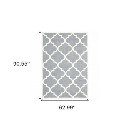 5' X 8' Grey And Ivory Geometric Shag Power Loom Stain Resistant Area Rug