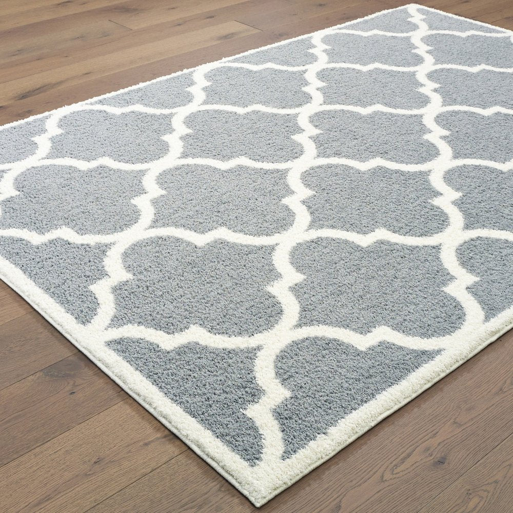 8' X 11' Gray And Ivory Geometric Shag Area Rug
