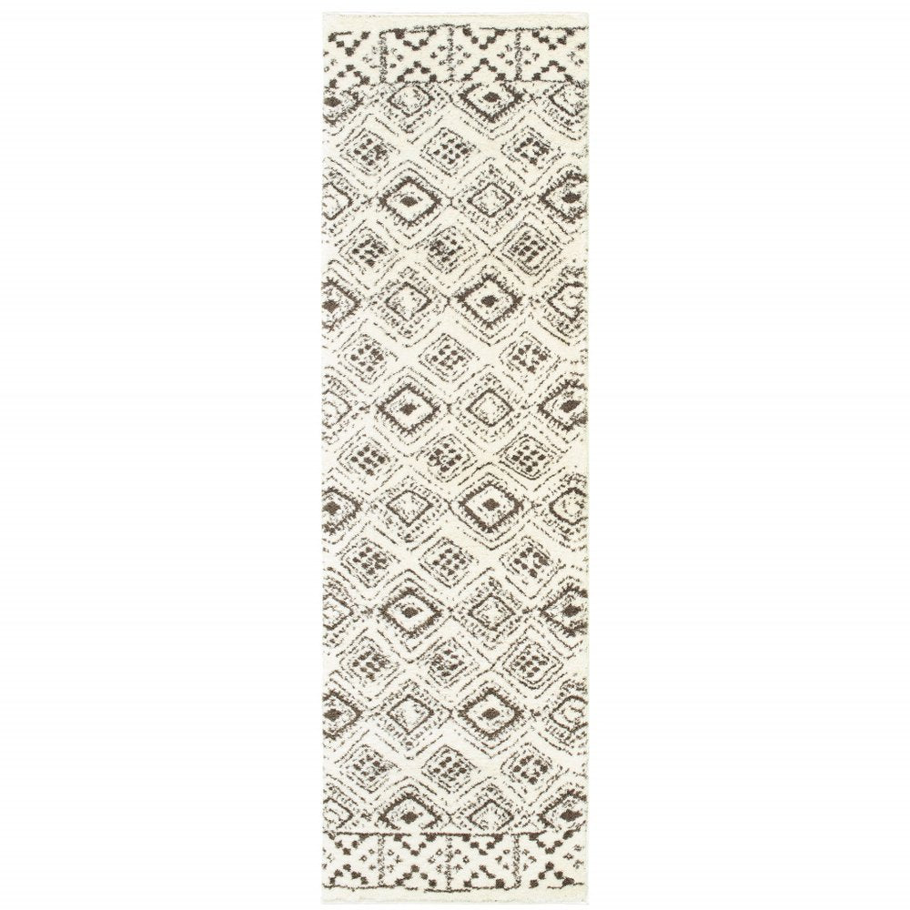 2' X 8' Ivory And Brown Geometric Shag Power Loom Stain Resistant Runner Rug